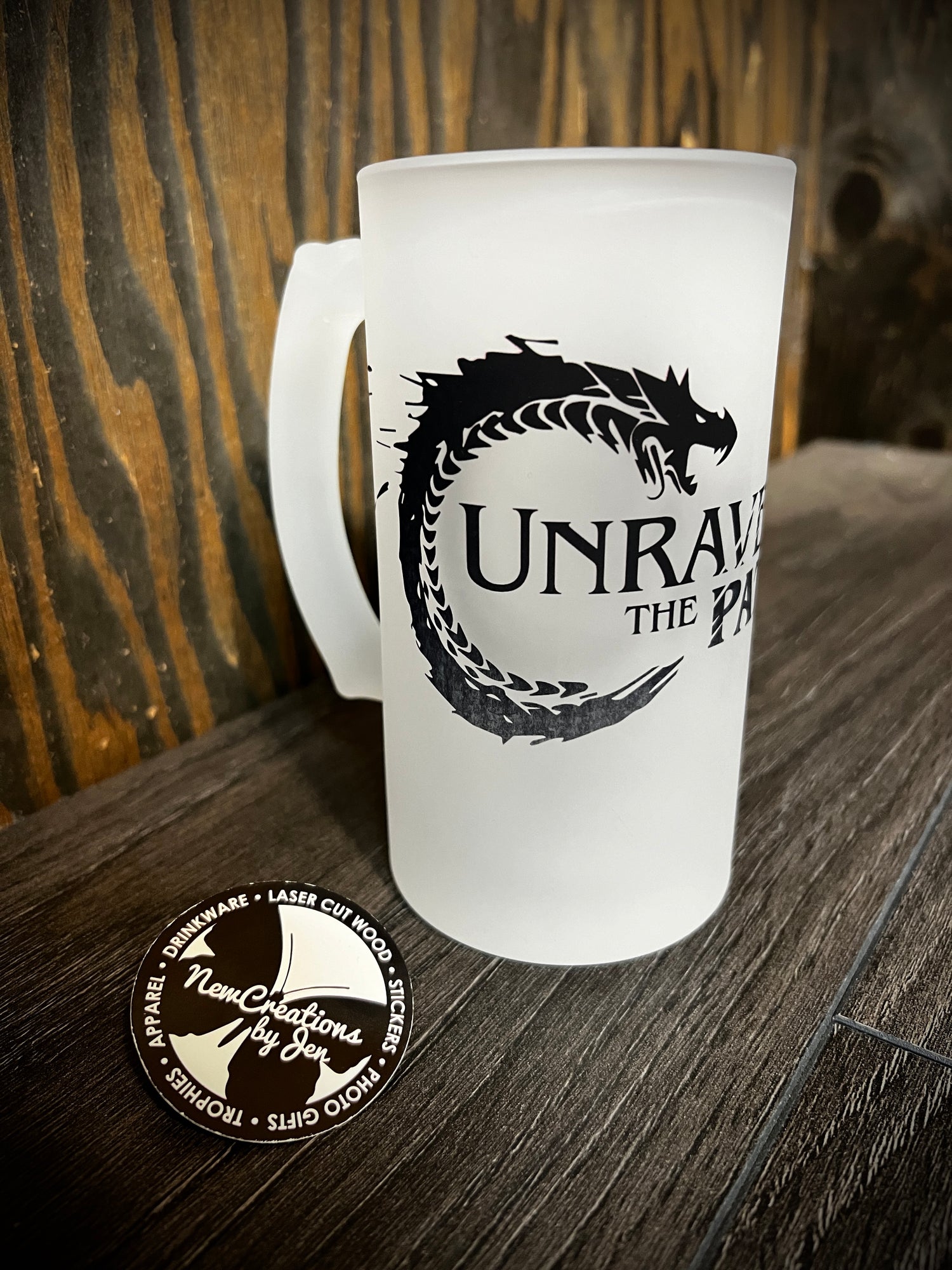 “Unraveling the Pattern” frosty mug with black dragon logo 