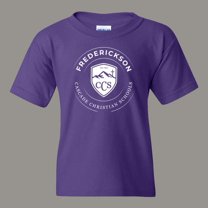 Purple t-shirt with 'Frederickson Cascade Christian Schools' logo on a gray background