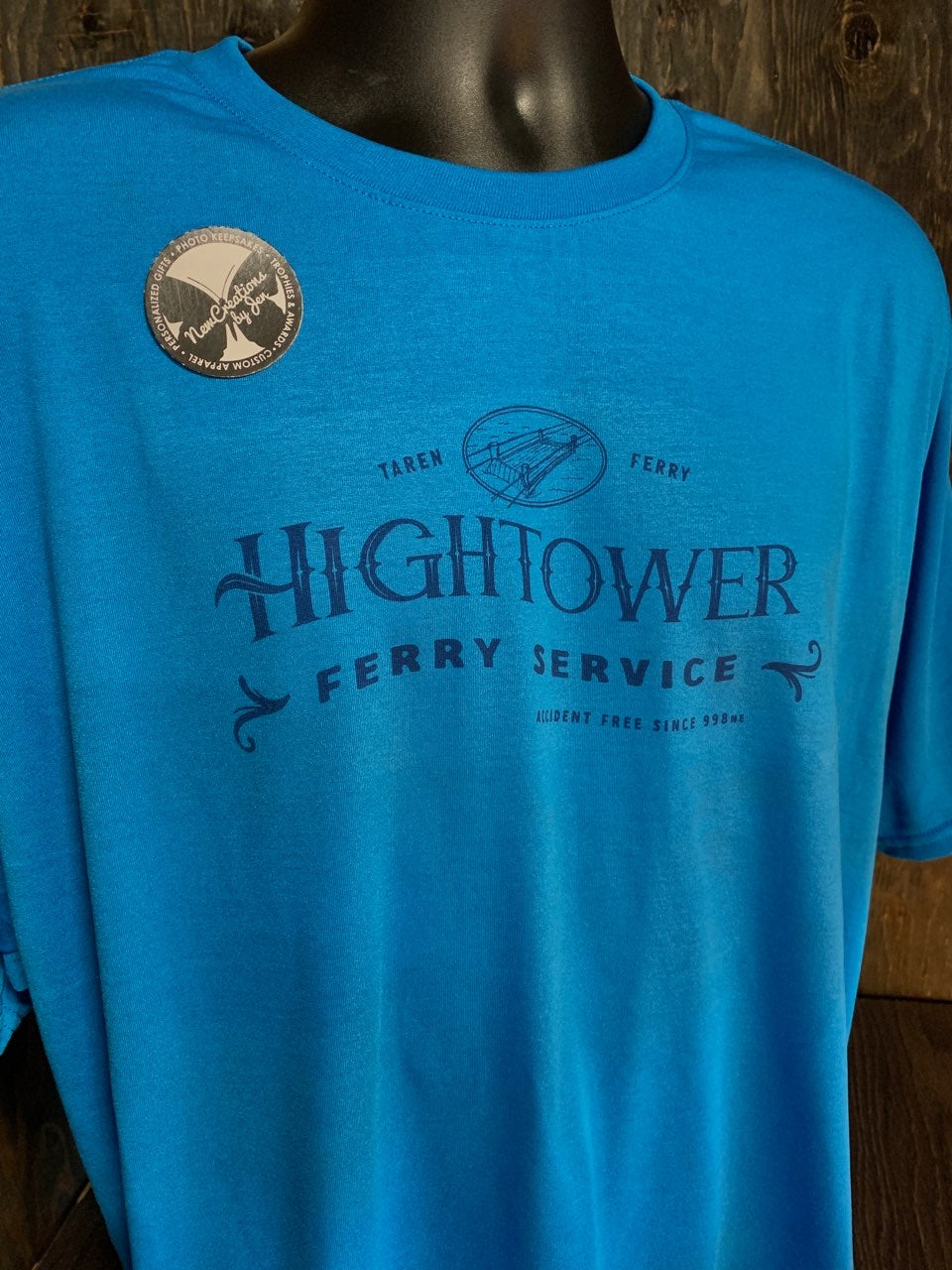 Servicio de ferry de Hightower: camisetas ligeras de recuerdo inspiradas en la Rueda del Tiempo